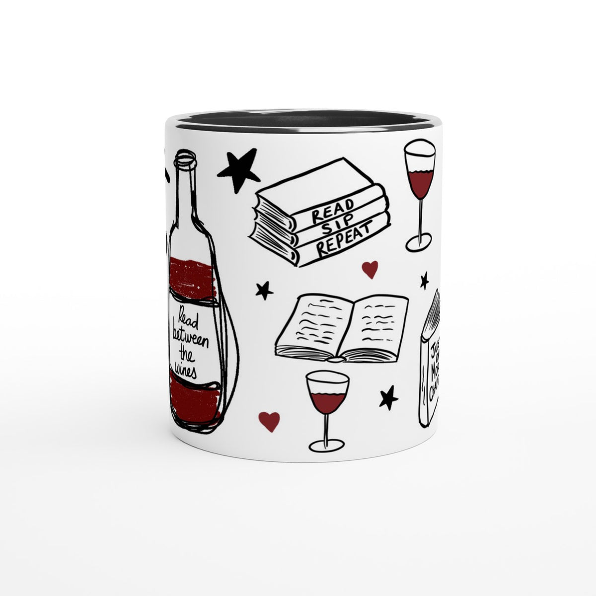 A white ceramic mug with a black interior and rim, decorated with illustrations of a wine bottle, wine glasses, an open book, a stack of books reading 'READ, SIP, REPEAT', and small red hearts on a white background.