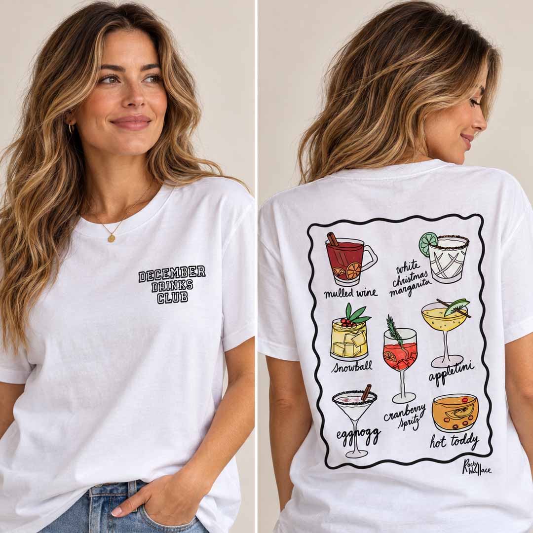 A woman modelling a white graphic T-shirt shown from both front and back. The front has small black text reading 'December Drinks Club' on the chest. On the back a selection of hand drawn Christmas Cocktails