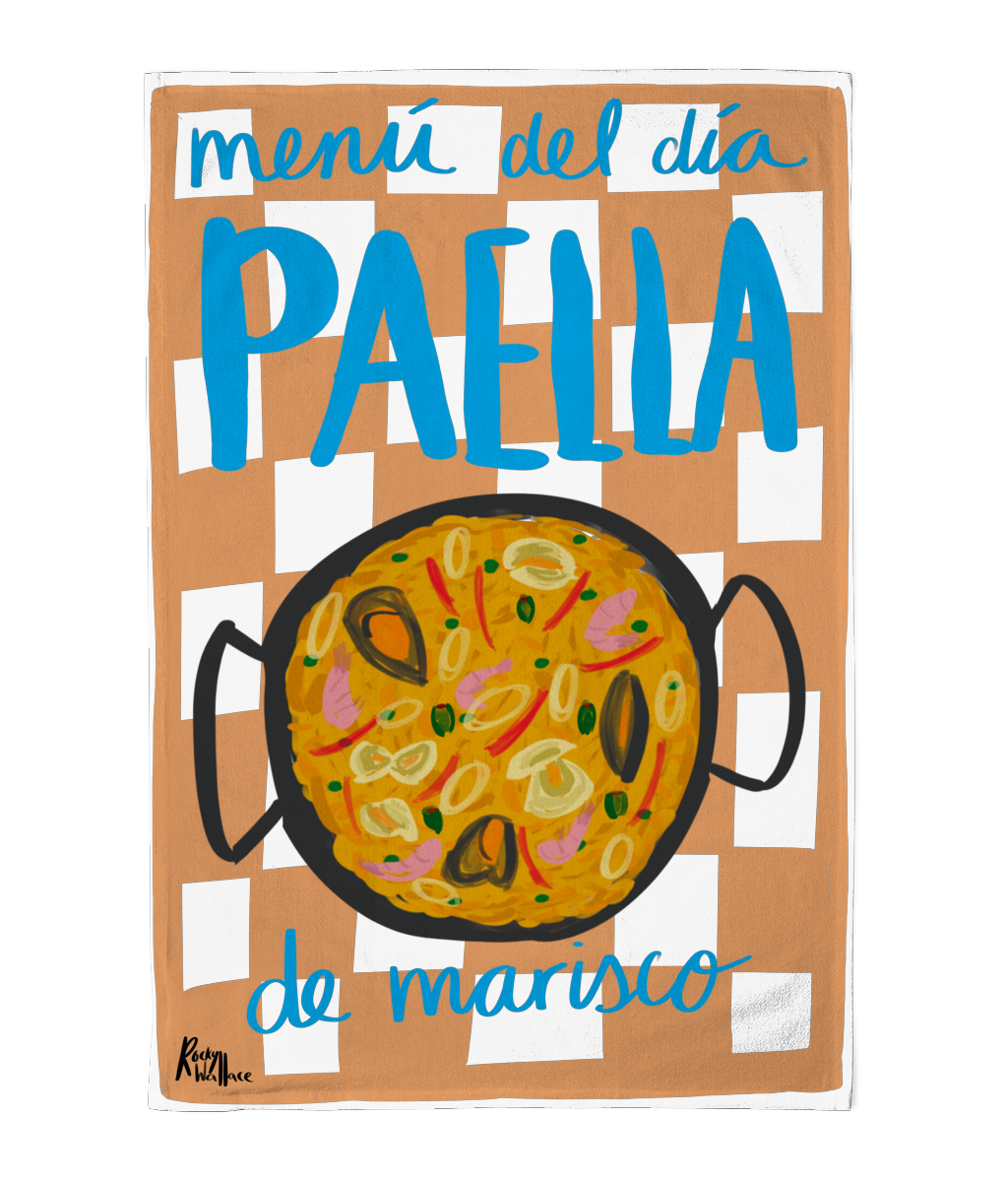 A cutout of a teatowel featuring a colorful hand-painted style graphic of a paella de marisco dish on a tan and white checkered background with the text 'menú del día PAELLA de marisco'.